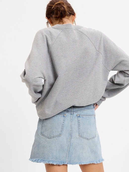 2 of 8 showing, with the color medium wash of product Rhinestone Denim Mini Skirt with Washwell