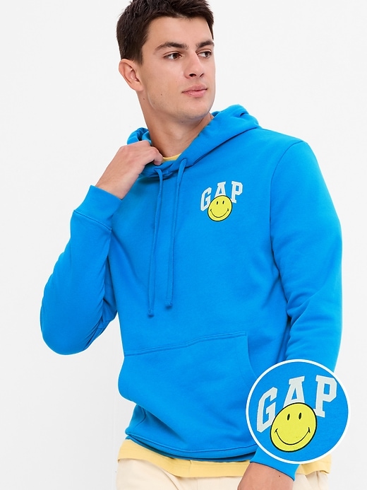1 of 8 showing, with the color TIDAL WAVE of product Gap × Smiley® Vintage Soft Logo Hoodie