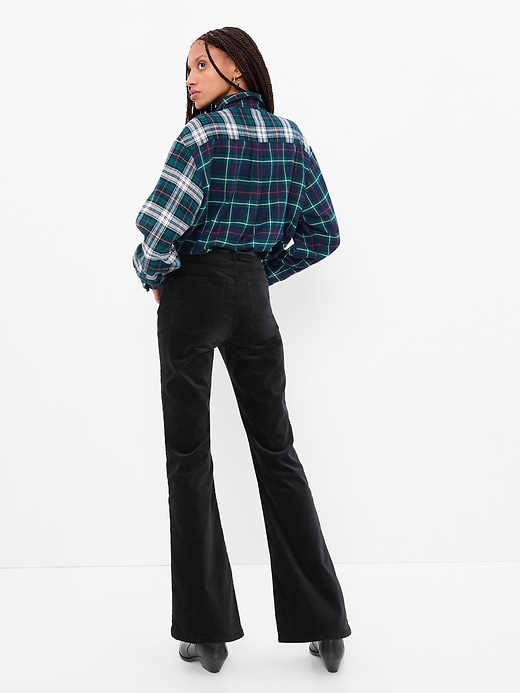 2 of 8 showing, with the color absolute black of product High Rise Velvet '70s Flare Jeans with Washwell
