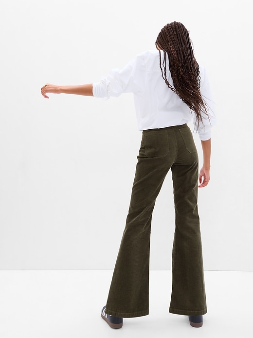 2 of 8 showing, with the color mistletoe green of product High Rise Corduroy '70s Flare Jeans with Washwell
