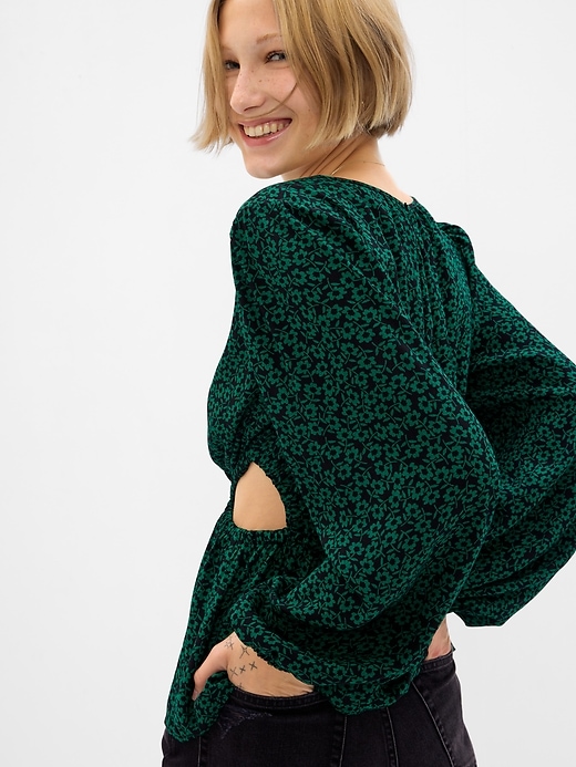 2 of 8 showing, with the color green floral of product Peplum Cutout Top