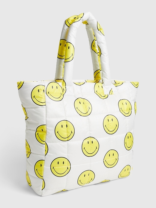 1 of 8 showing, with the color birch beige of product Gap × Smiley® Puffer Tote Bag