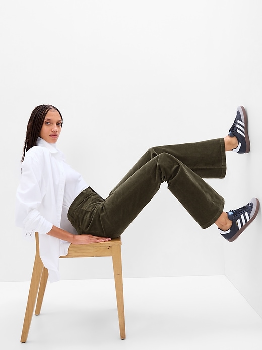 1 of 8 showing, with the color mistletoe green of product High Rise Corduroy '70s Flare Jeans with Washwell