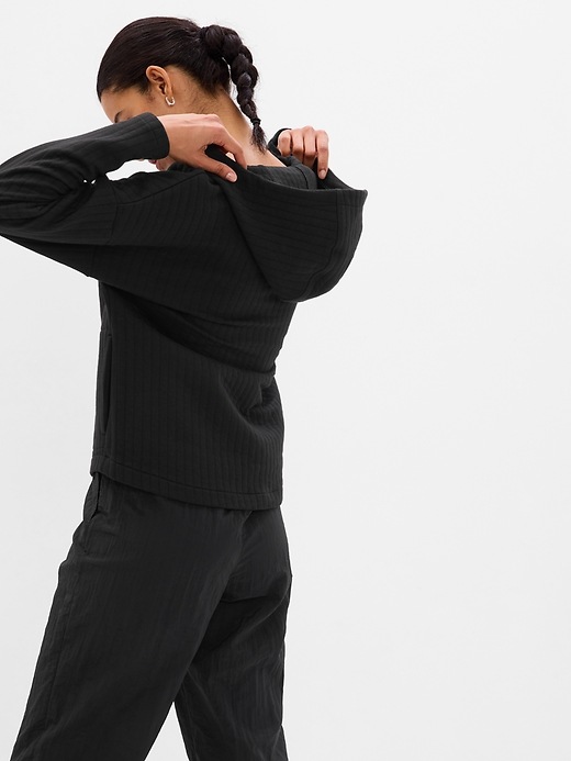2 of 8 showing, with the color true black of product GapFit Jacquard Full-Zip Jacket