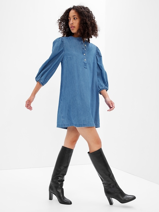 1 of 8 showing, with the color medium wash of product Denim Popover Mini Dress with Washwell