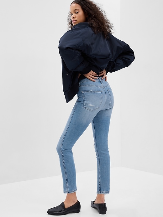 2 of 8 showing, with the color light wash of product High Rise Vintage Slim Jeans