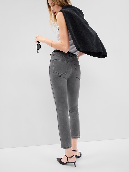 2 of 8 showing, with the color washed black of product Mid Rise Vintage Slim Jeans with Washwell
