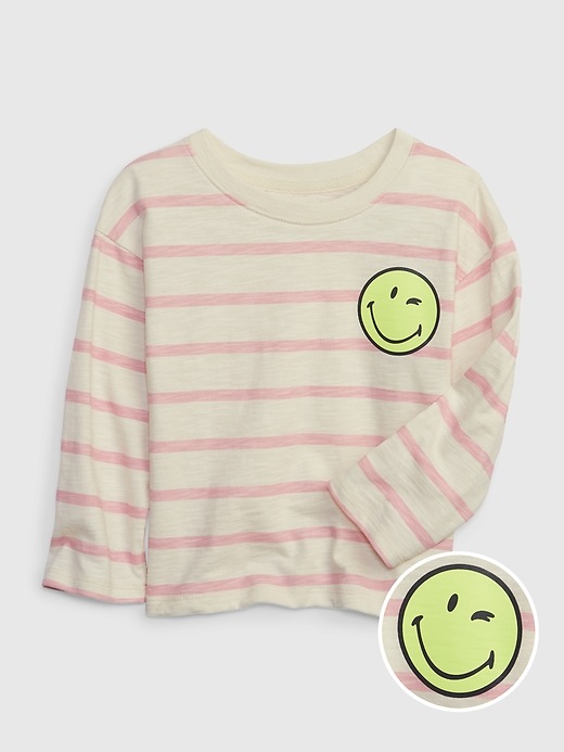 1 of 8 showing, with the color pink stripe of product Gap × SmileyWorld® Toddler Striped Shirt