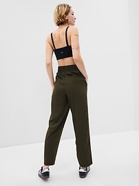 View large product image 7 of 12. GapFit High Rise Runaround Pants