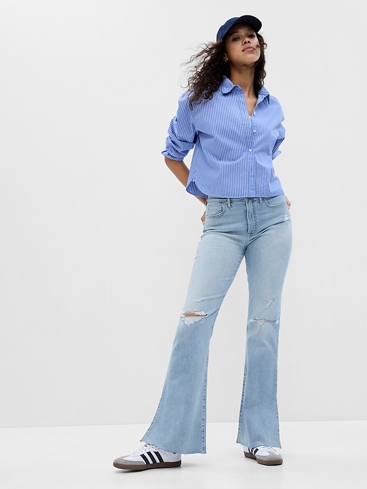 1 of 8 showing, with the color light wash of product High Rise Split-Hem '70s Flare Jeans