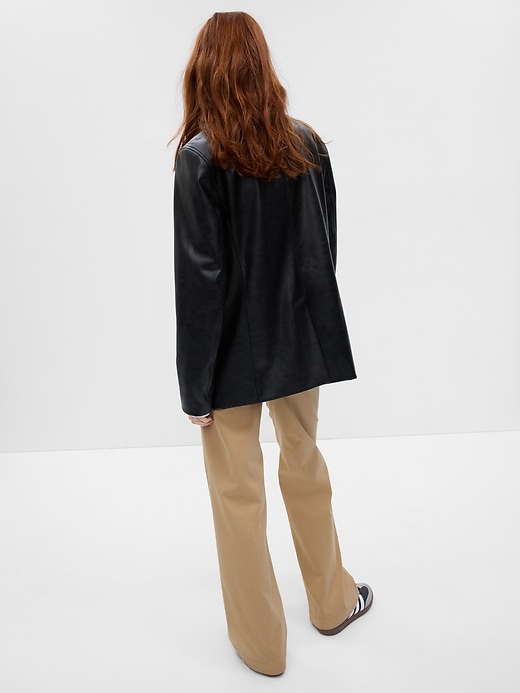 2 of 8 showing, with the color cashew crunch tan of product High Rise Flare Khakis