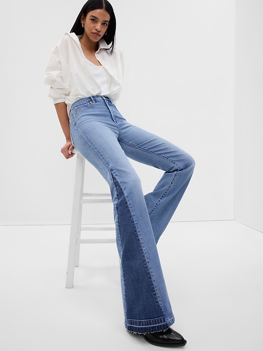 Image number 1 showing, High Rise Patched '70s Flare Jeans with Washwell