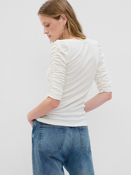 2 of 8 showing, with the color new off white of product Featherweight Ruched Sleeve Rib Top