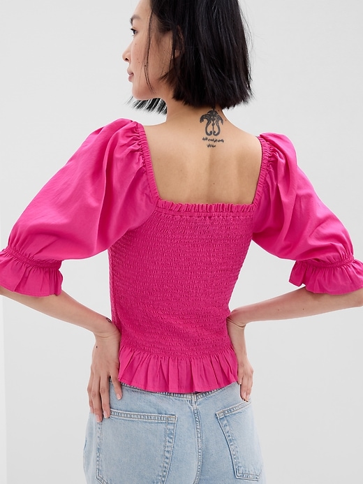 2 of 8 showing, with the color viva magenta pink of product Puff Sleeve Smocked Peplum Top