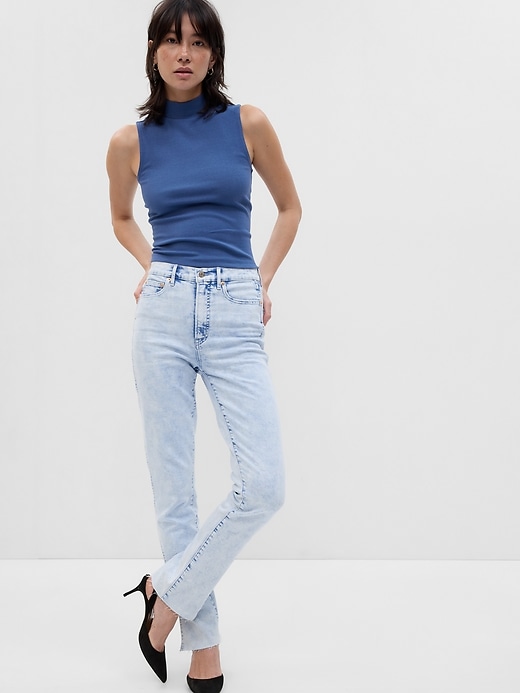 1 of 8 showing, with the color light indigo of product High Rise Split-Hem Vintage Slim Jeans