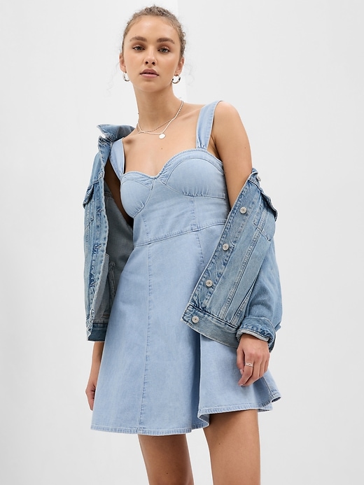 1 of 8 showing, with the color medium wash of product Sweetheart Denim Mini Dress