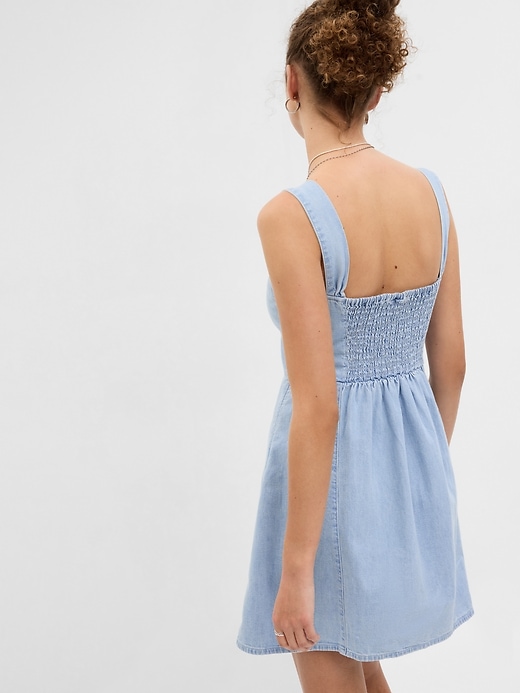 2 of 8 showing, with the color medium wash of product Sweetheart Denim Mini Dress
