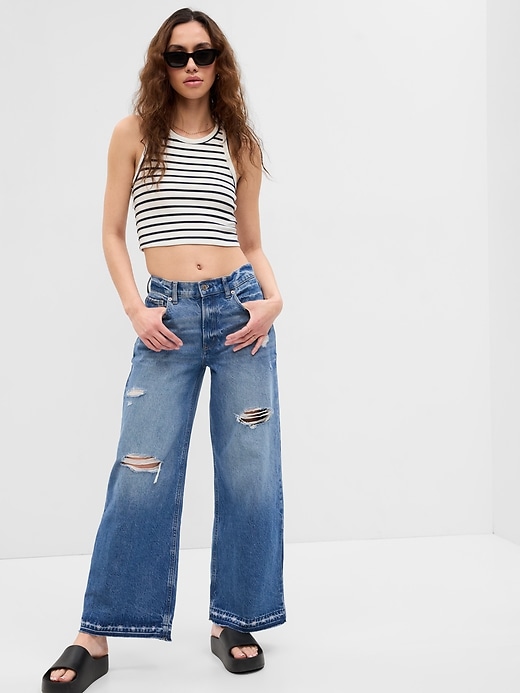 1 of 8 showing, with the color light wash of product Low Rise Wide Baggy Jeans