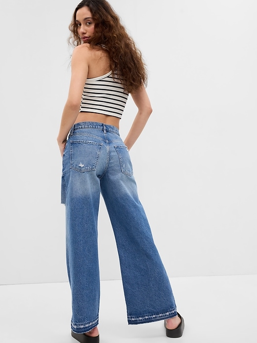 2 of 8 showing, with the color light wash of product Low Rise Wide Baggy Jeans