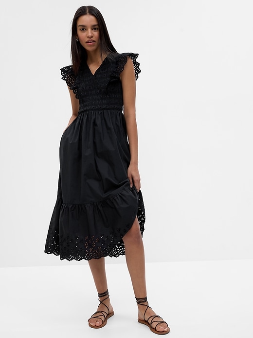 1 of 8 showing, with the color black of product Ruffle Sleeve Smocked Midi Dress