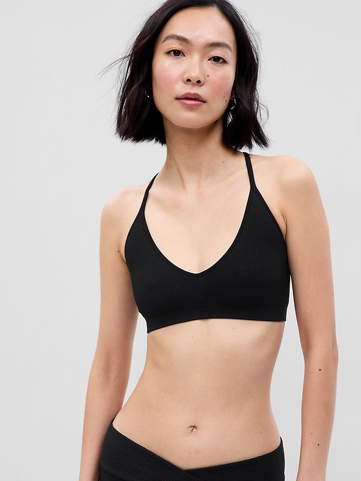 1 of 8 showing, with the color true black of product Seamless Rib Triangle Bralette
