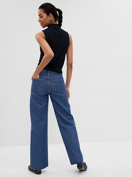 2 of 8 showing, with the color dark indigo of product BetterMade Denim Low Rise Stride Jeans