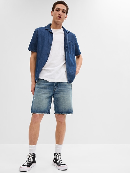 1 of 8 showing, with the color MEDIUM WASH of product '90s Loose Denim Shorts