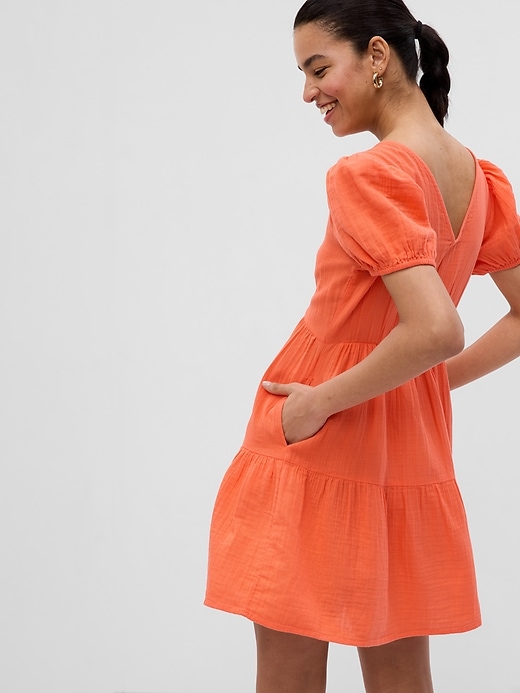 2 of 8 showing, with the color orange coral of product Crinkle Gauze Puff Sleeve Tiered Mini Dress