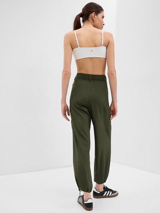 View large product image 2 of 2. GapFit To-Go Cargo Parachute Pants