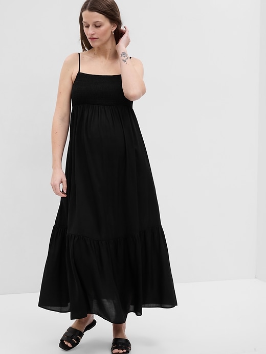 1 of 8 showing, with the color true black of product Maternity Smocked Maxi Dress
