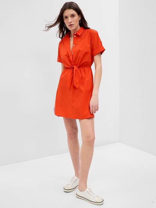 1 of 8 showing, with the color lava orange of product Tie-Front Mini Shirtdress