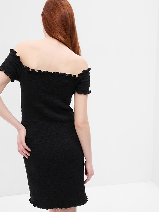 2 of 8 showing, with the color black of product Off-Shoulder Smocked Mini Dress
