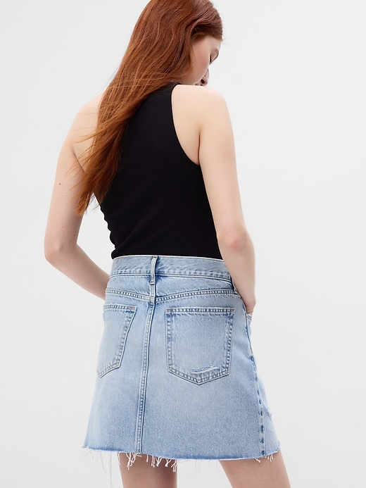 2 of 8 showing, with the color medium wash of product High Rise Denim Mini Skirt with Washwell