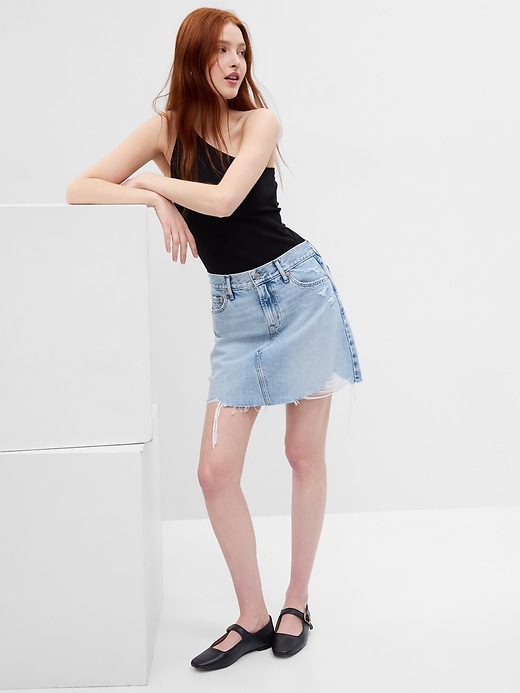 Image number 1 showing, High Rise Denim Mini Skirt with Washwell