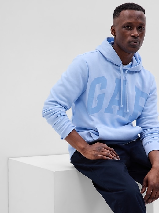 1 of 8 showing, with the color cerulean blue of product Gap Arch Logo Hoodie