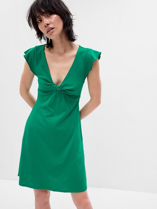 1 of 8 showing, with the color deluxe green of product Flutter Sleeve Twist-Front Mini Dress