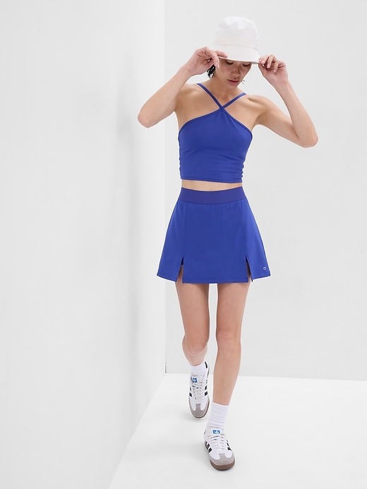 1 of 8 showing, with the color mosaic blue of product Eclipse Split-Front Exercise Skort