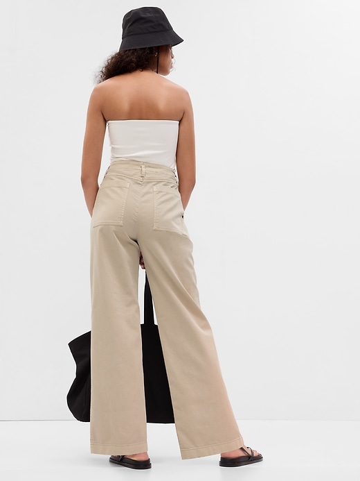 2 of 8 showing, with the color moonstone tan of product Mid Rise Loose Khakis