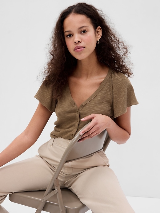 1 of 8 showing, with the color dried moss green of product Essential Rib Flutter Sleeve Button-Front Top