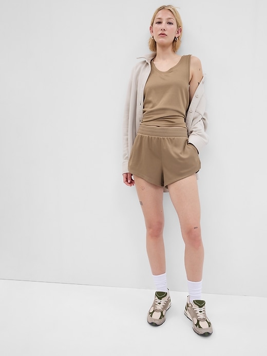 1 of 8 showing, with the color chino tan of product GapFit High Rise Mesh Running Shorts