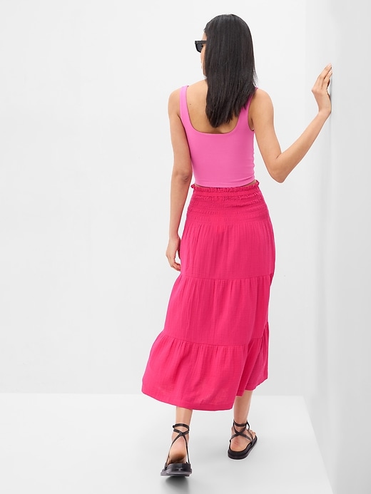 2 of 8 showing, with the color sizzling fuchsia pink of product Smocked Tiered Midi Skirt