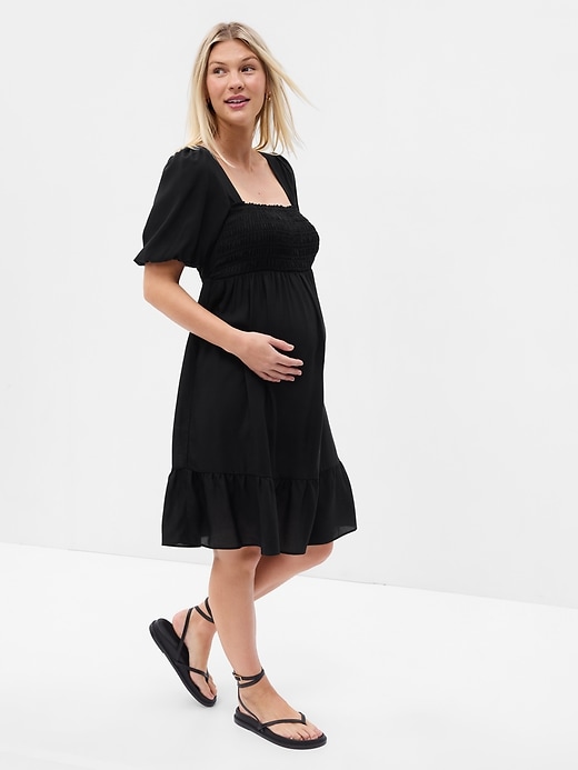 1 of 8 showing, with the color true black of product Maternity Smocked Midi Dress