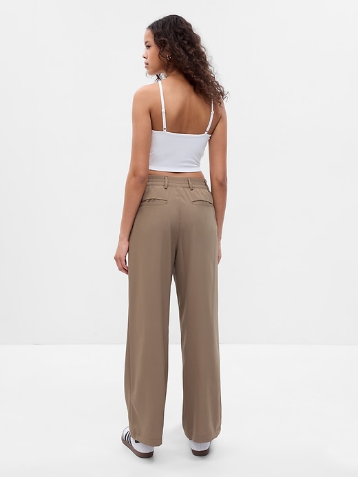 2 of 8 showing, with the color dried moss green of product GapFit High Rise Runaround Trousers