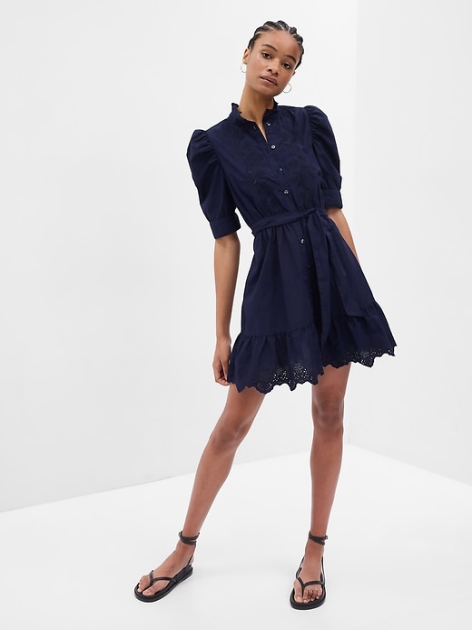 1 of 8 showing, with the color navy blue of product Puff Sleeve Eyelet Mini Dress