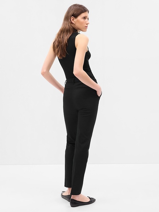 2 of 8 showing, with the color black of product Mid Rise BiStretch Ankle-Zip Slim Pants