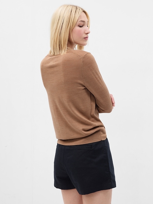 2 of 8 showing, with the color camel heather tan of product Merino Wool Crewneck Sweater