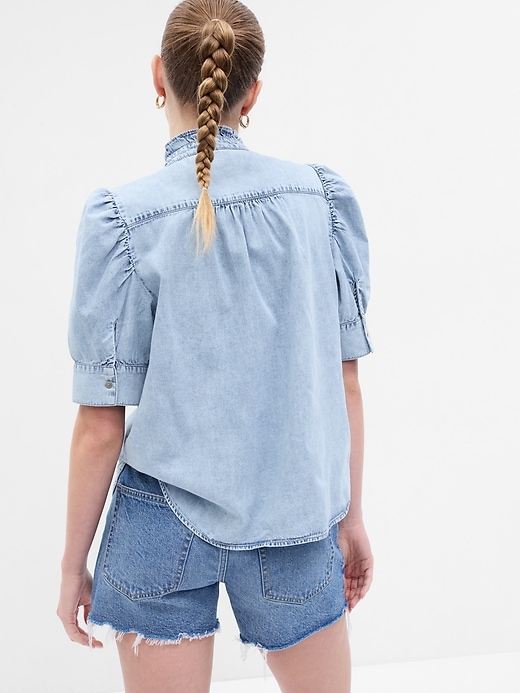 2 of 8 showing, with the color blue marble wash of product Puff Sleeve Ruffle Denim Shirt