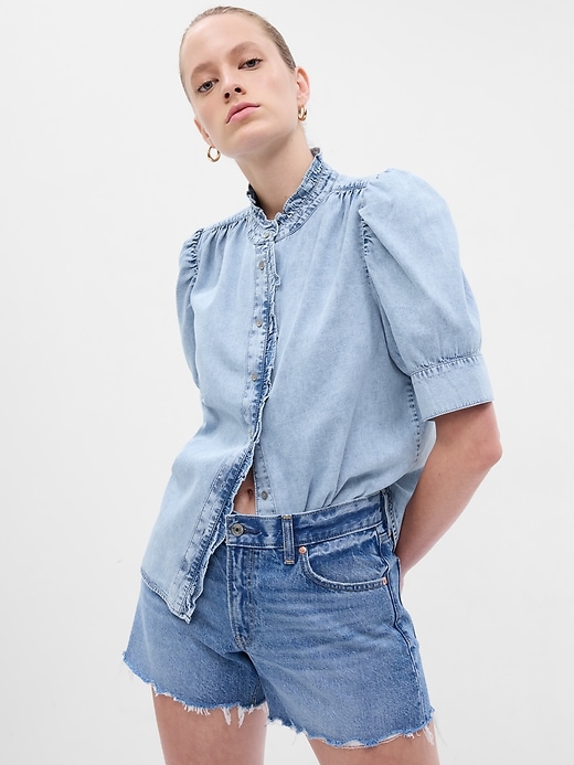1 of 8 showing, with the color blue marble wash of product Puff Sleeve Ruffle Denim Shirt