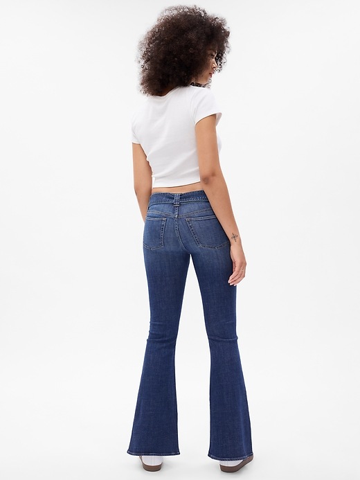 2 of 8 showing, with the color dark indigo of product Low Rise Y2K Flare Jeans