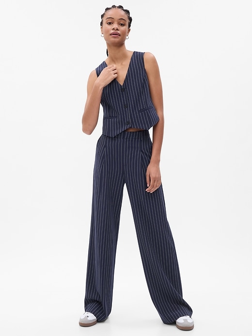 1 of 8 showing, with the color navy blue pinstripe of product High Rise Pleated Wide-Leg Trousers